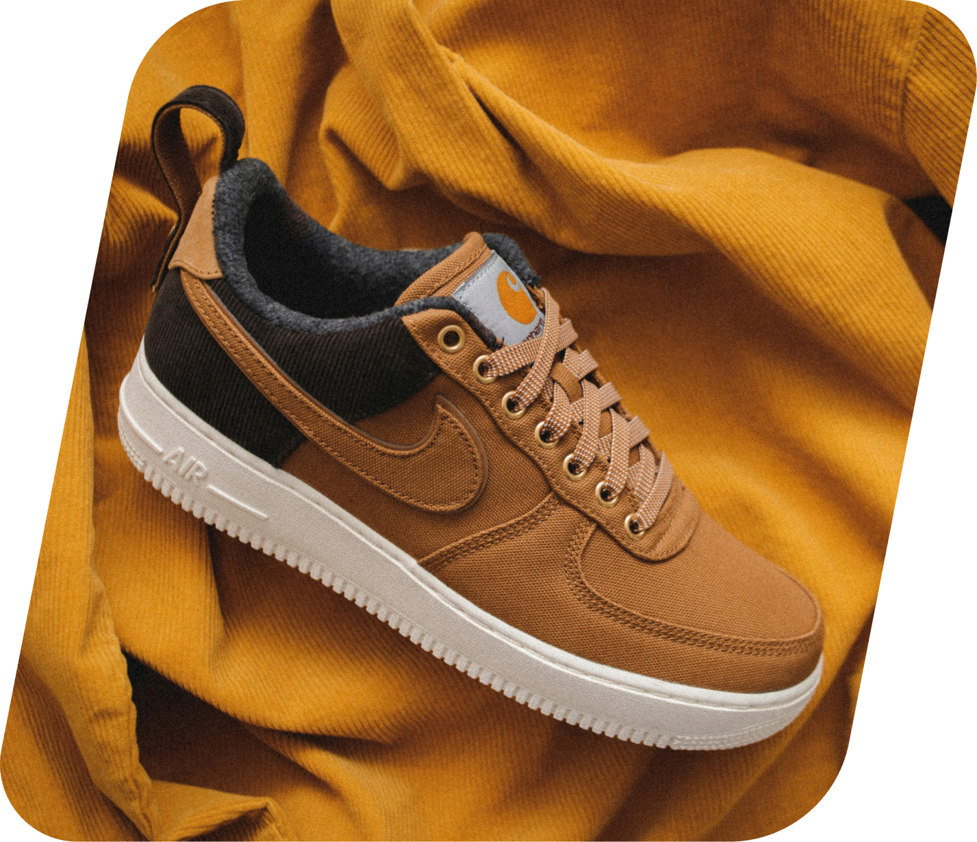 Tan Nike Air Force 1 on corduroy fabric